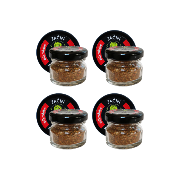 View of four jars of dried spice with chilli arranged in a row. Visual representation of the availability of this spicy addition that gives every dish nutritional value and a hot note.