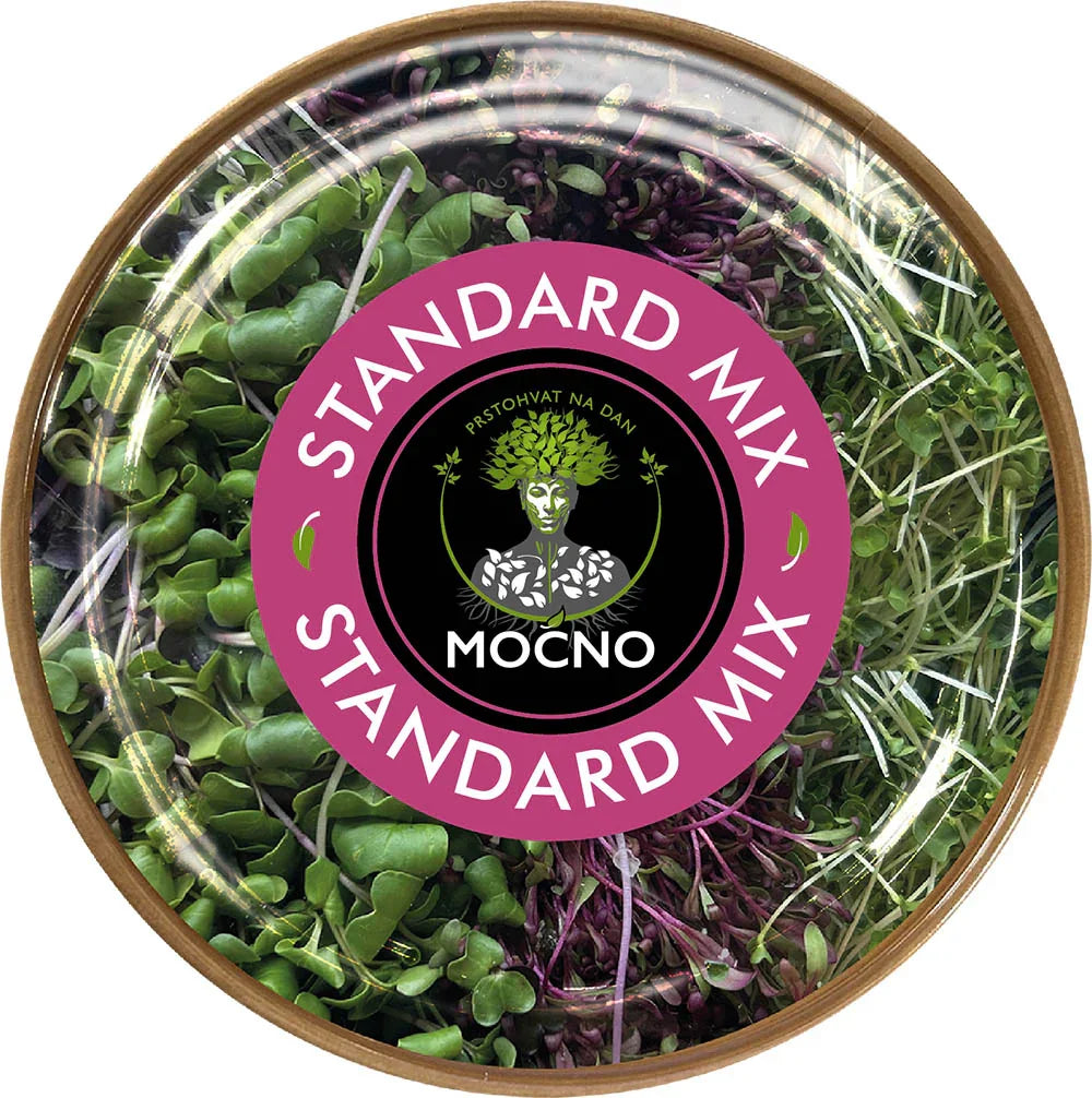Clear shot of the Standard Mix packaging lid from above. The focus is on the pink label design with the MOĆNO logo and the name of the mixture, which represents the base of every healthy meal.