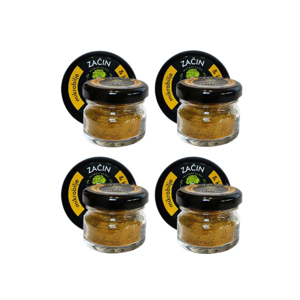 Four jars of MOĆNO Turmeric dried microgreens seasoning grouped together