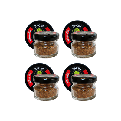 View of four jars of dried spice with chilli arranged in a row. Visual representation of the availability of this spicy addition that gives every dish nutritional value and a hot note.