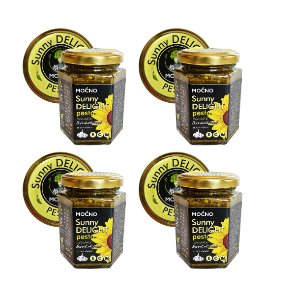 View of four jars of Sunny Delight pesto arranged in a row. Visual representation of the availability of this microgreens spread that protects cells and supports skin health.