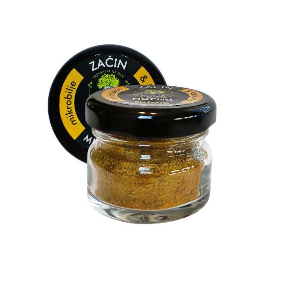 MOĆNO Turmeric dried microgreens seasoning in an open glass jar